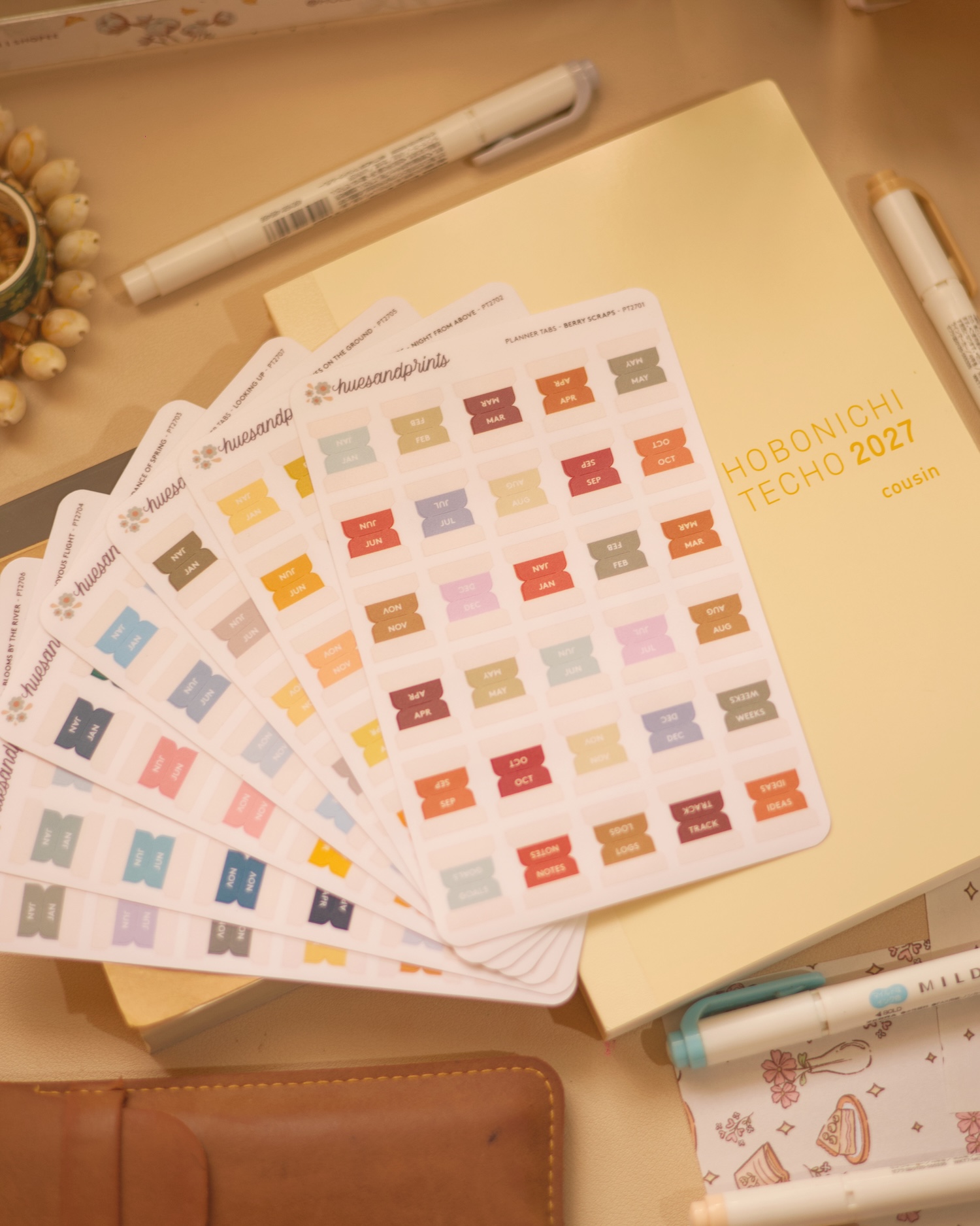 planner tabs all colors available and the hobonichi cousin